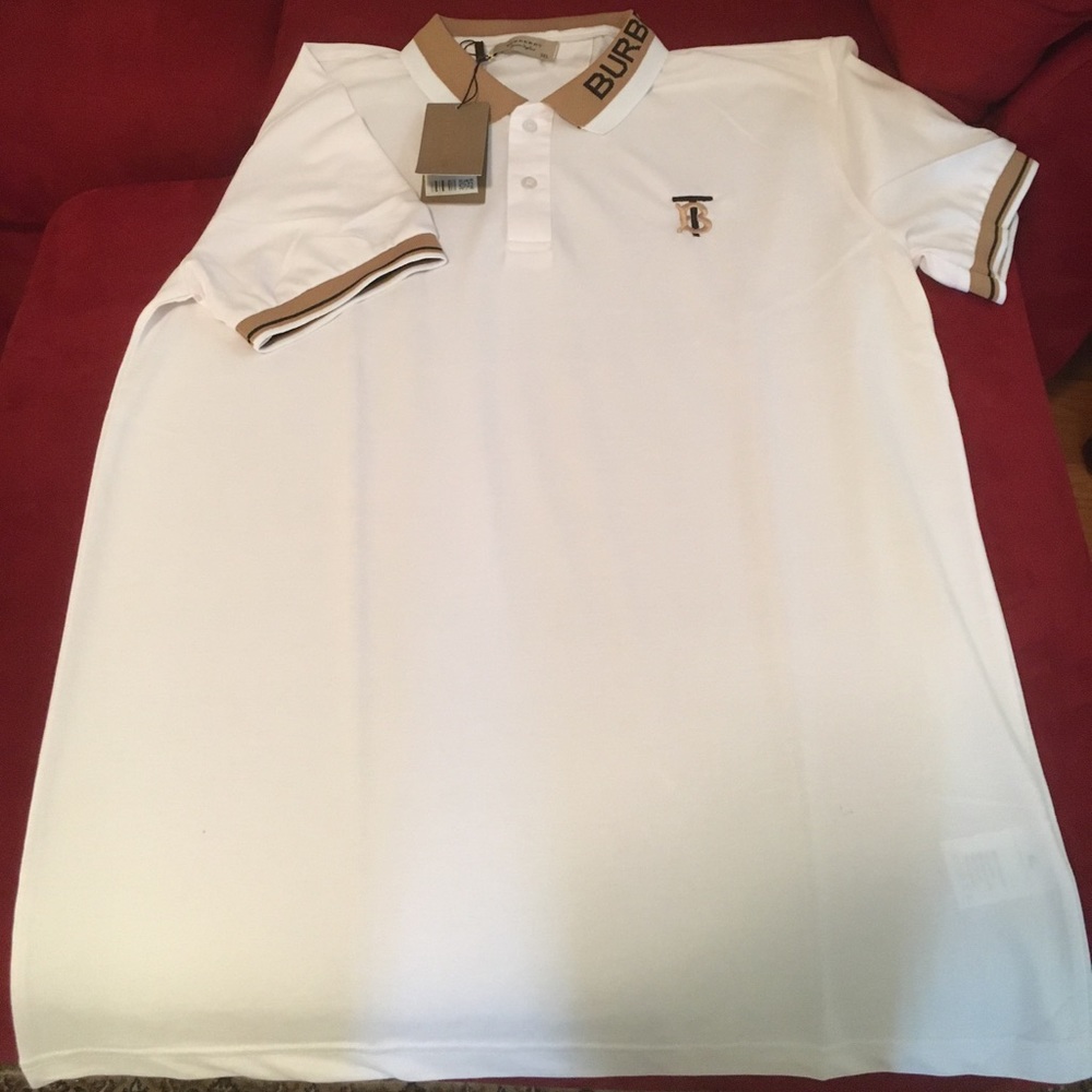 Burberry polo with new logo. Size 3XL but fits like a XL. New. Never worn.